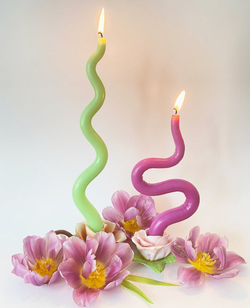 lime green wavy candle and magenta plum wiggle candle